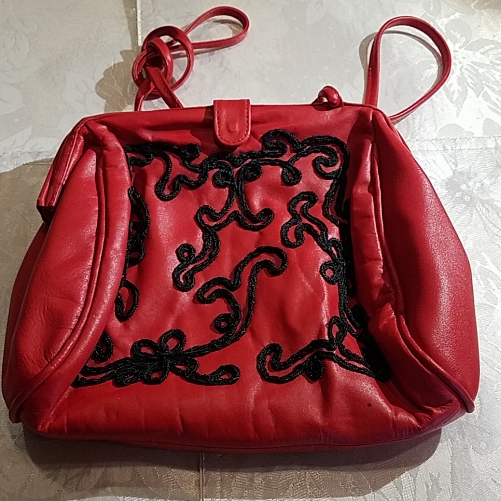 Red leather handbag